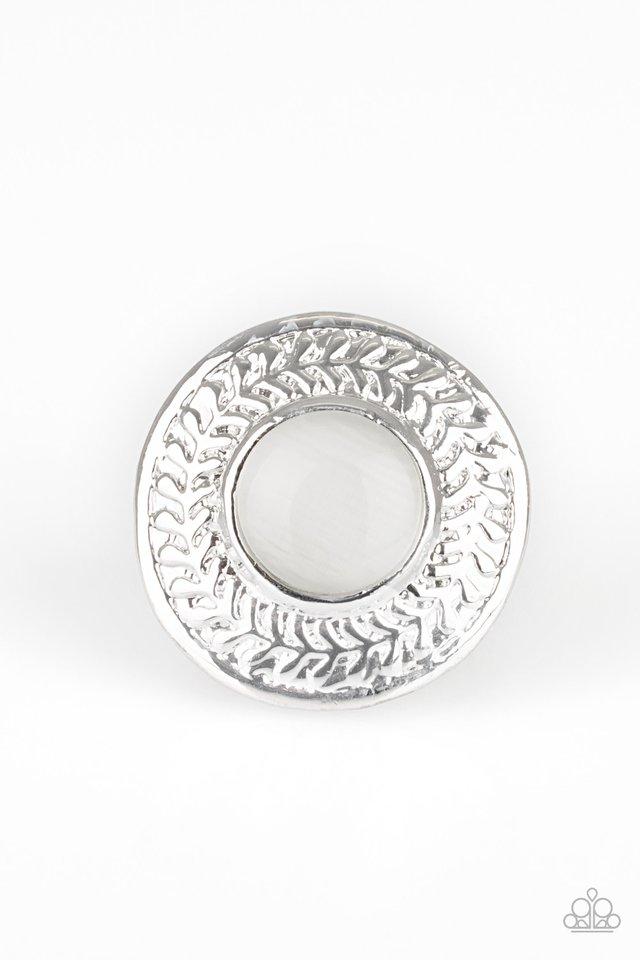 Garden Garland - White Moonstone Ring - Paparazzi Accessories - 
A glowing white moonstone is pressed into a large silver frame embossed in a leafy pattern for a whimsical look. Features a stretchy band for a flexible fit.
