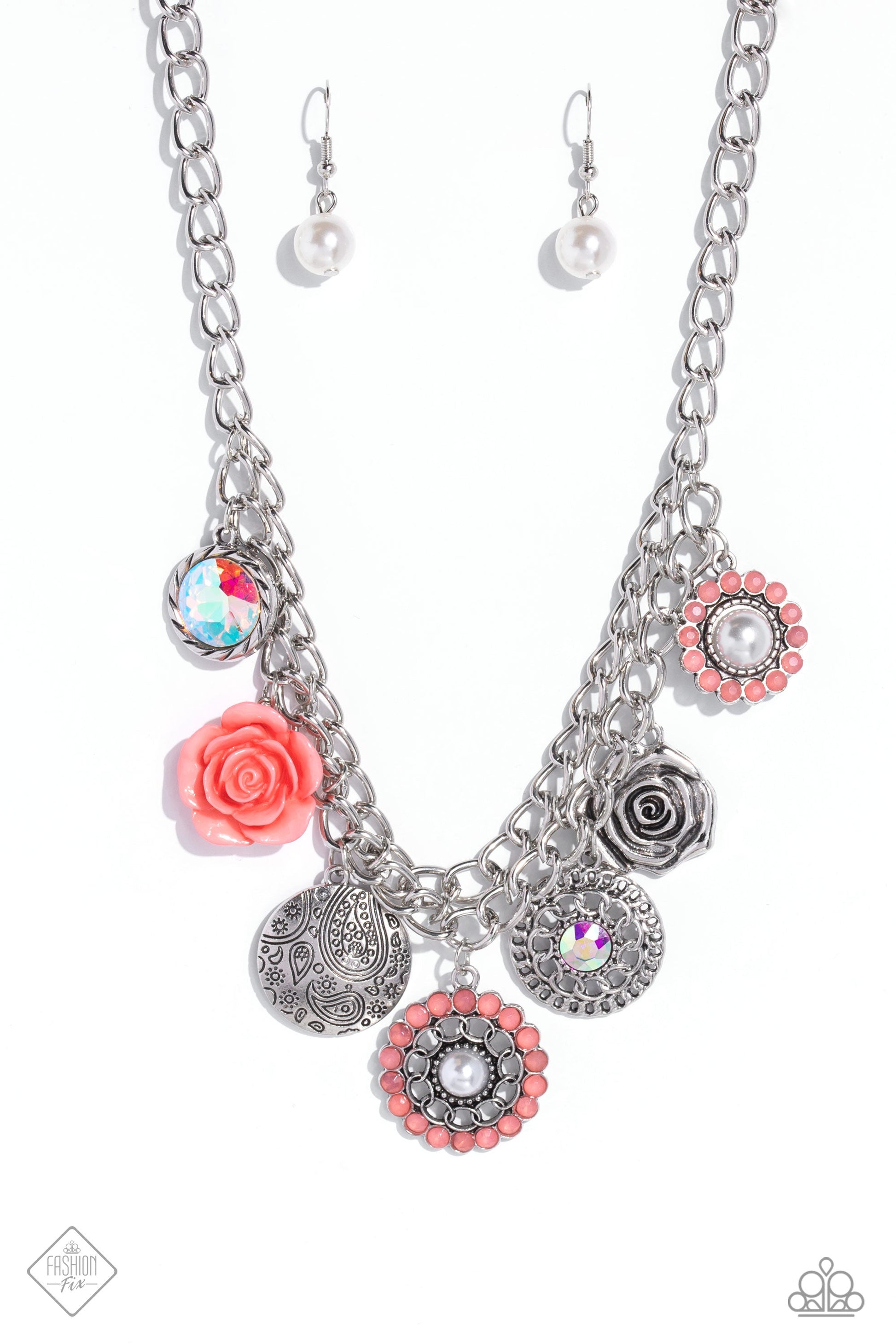 Garden Grace - Orange and Silver Necklace - Paparazzi Accessories - A collection of whimsical botanical charms gathers along a flat, silver, double-curbed chain. The featured charms include a Peach Pink resin flower, a metallic rose, a silver disc stamped with a paisley motif, an oversized, faceted orange iridescent gem bordered in textured silver, an iridescent gem encompassed by alternating chains, and a pearl-centered flower with Peach Pink gem petals, creating a floral fantasy.
