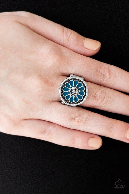 Garden View - Blue and Silver Floral Ring - Paparazzi Accessories - Brushed in an antiqued shimmer, refreshing blue petals spin into a whimsical floral pattern atop the finger. Features a stretchy band for a flexible fit.