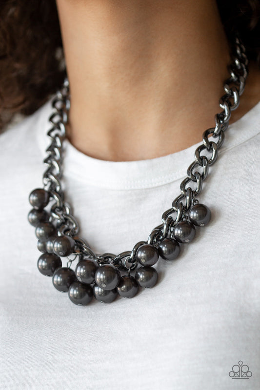 Get Off My Runway - Black Gunmetal Necklace & Earrings - Paparazzi Accessories - 
Pearly gunmetal beads swing from the bottom of a hefty gunmetal chain, creating a dramatic fringe below the collar. Features an adjustable clasp closure.
