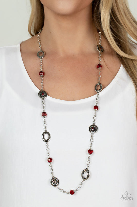 Glammed Up Goals - Red and Silver Fashion Necklace - Paparazzi Accessories - Red beads capped in silver accents and antiqued silver medallions dotted with red rhinestone centers and radiating texture alternate with sections of silver chain creating a charismatic allure across the chest.