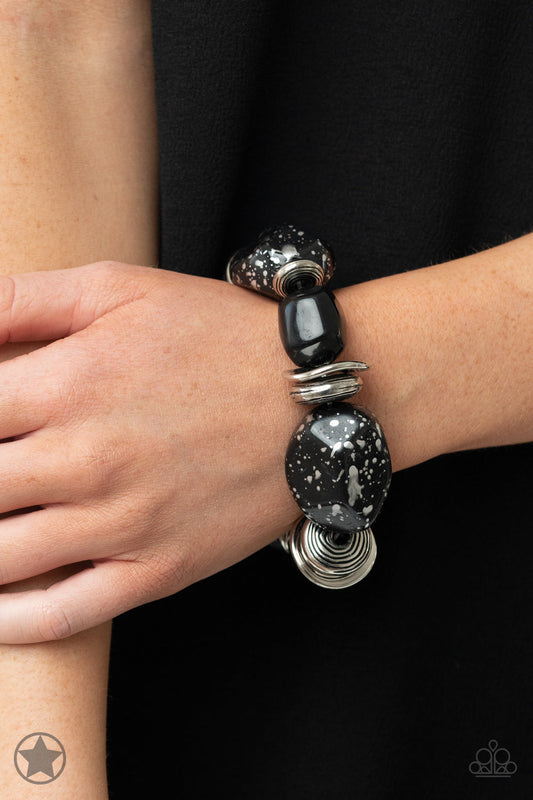 Glaze of Glory - Black and Silver Stretchy Bracelet - Paparazzi Accessories - Chunky black beads with speckles of silver and a gorgeous glazed finish are threaded along a stretchy band with thick silver rings. Sold as one individual bracelet.