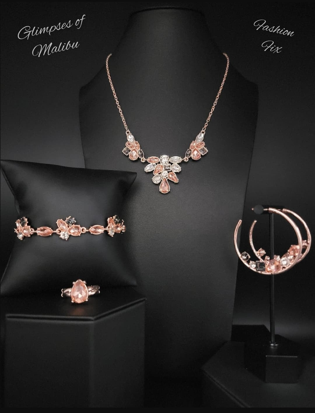 Glimpses of Malibu - 4 Piece Rose Gold Trend Blend Jewelry Set - Paparazzi Accessories - Includes one of each accessory in the Glimpses of Malibu Trend Blend in April's Fashion Fix: Completely Captivated Necklace, Attractive Allure Earrings, Colorful Captivation Bracelet, Law of Attraction Fashion Ring.  Featuring playful styles accented with fun pops of color, the Glimpses of Malibu Collection is an endearing assortment of cheerful and whimsical laid-back fashion.