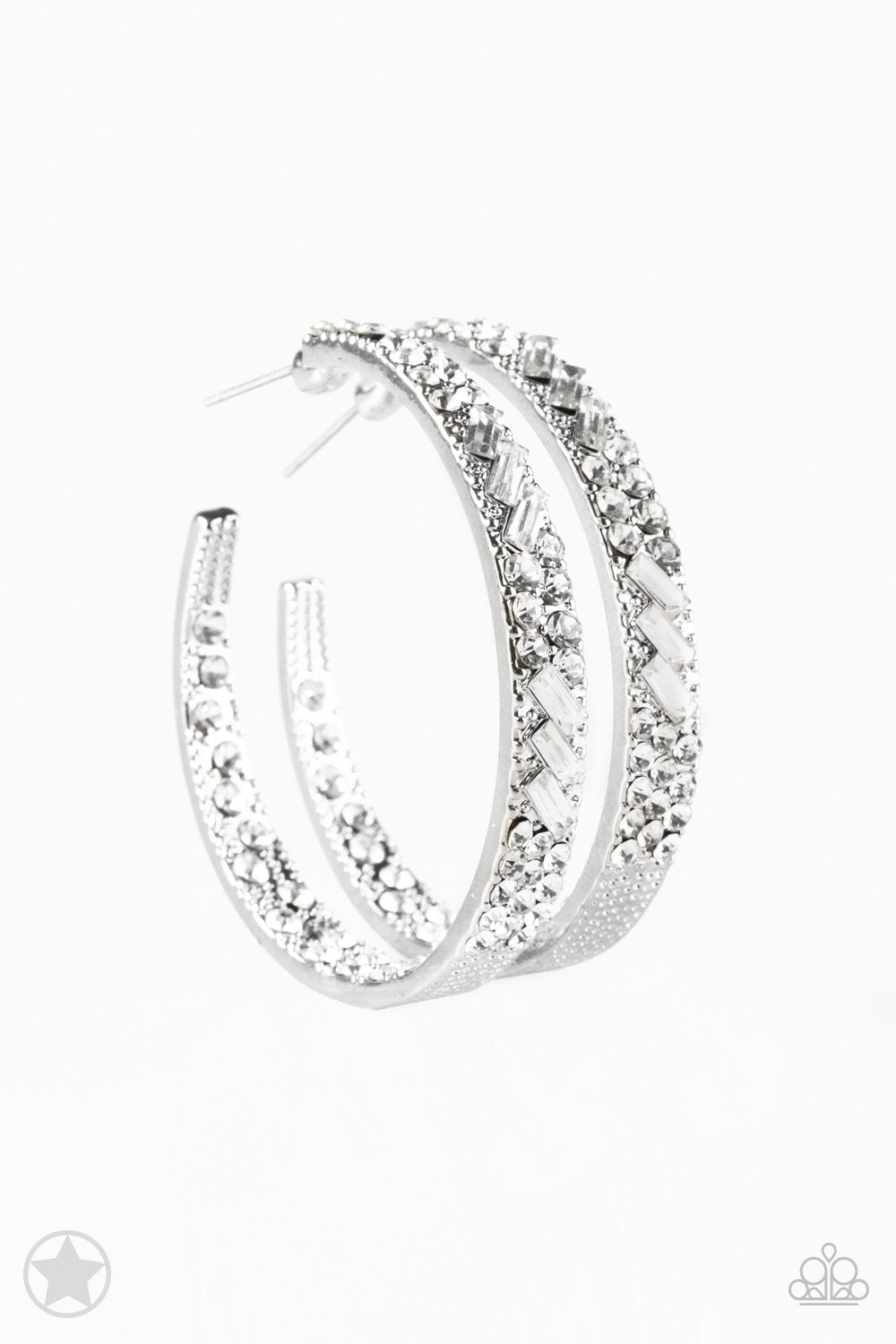 GLITZY By Association - Silver Hoop Earrings - Paparazzi Accessories - The front facing surface of a chunky silver hoop is dipped in brilliantly sparkling rhinestones while light-catching texture wraps around the back. The interior of the hoop features the opposite pattern creating the illusion of a full hoop of blinding rhinestones. Earring attaches to a standard post fitting. Hoop measures 1 3/4" in diameter. 