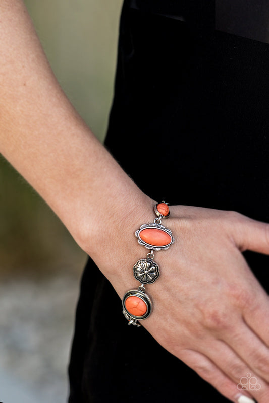 Gorgeously Groundskeeper - Orange and Silver Bracelet - Paparazzi Accessories - Vivacious orange stone centers, a collection of antiqued silver frames link with a decorative floral charm around the wrist for a seasonal flair. Features an adjustable clasp closure. Sold as one individual bracelet.