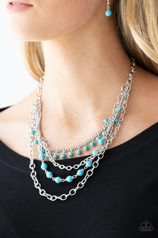 Ground Forces - Blue and Silver Necklace - Paparazzi Accessories - Featuring refreshing turquoise stone accents, mismatched silver chains layer below the collar for a seasonal look. Features an adjustable clasp closure.