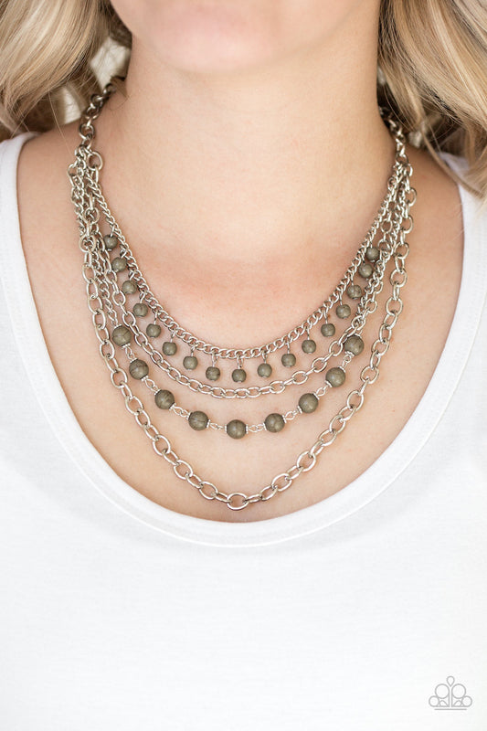 Ground Forces - Green and Silver Necklace - Paparazzi Accessories - Featuring earthy green stone accents, mismatched silver chains layer below the collar for a seasonal look. Features an adjustable clasp closure. 