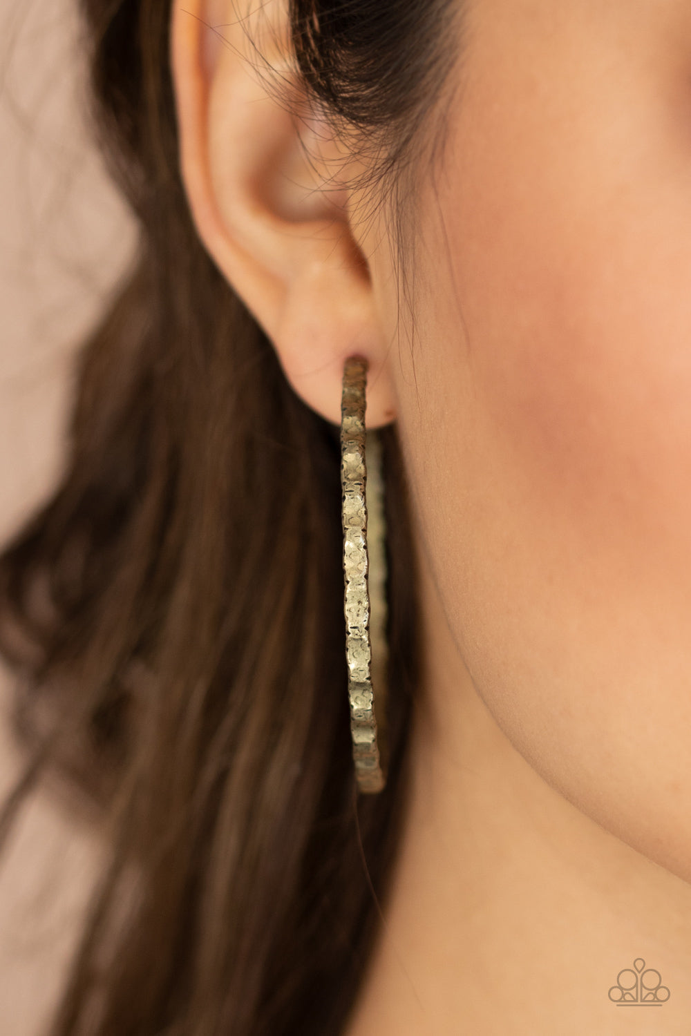 Grungy Grit - Brass Hoop Earrings - Paparazzi Accessories - Brushed in an antiqued finish, a gritty brass hoop is hammered in grungy details for an edgy industrial flair. Earring attaches to a standard post fitting. Hoop measures approximately 2" in diameter. 