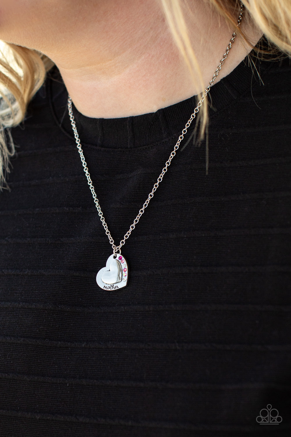 Happily Heartwarming - Pink and Silver Heart Mother Necklace - Paparazzi Accessories - Stamped in the word, "Mother," an embossed heart pendant is encrusted in a row of pink, white, and iridescent rhinestones, creating a sparkly sentimental centerpiece below the collar. Features an adjustable clasp closure.