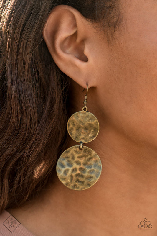 HARDWARE-Headed - Brass Fashion Earrings - Paparazzi Accessories - Hammered in rippling waves, a pair of textured brass discs link into a dramatic lure with industrial edgy fashion earrings. Trendy fashion jewelry for everyone.