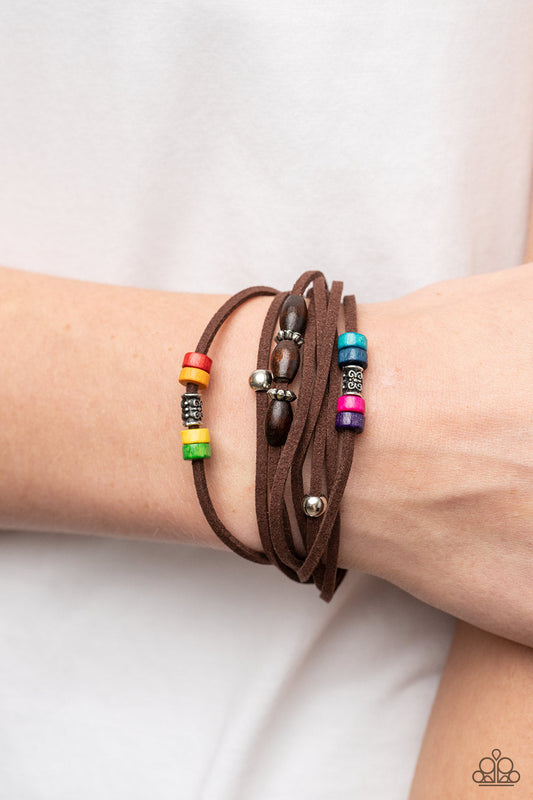 Have a WANDER-ful Day - Multi Color - Brown Suede Bracelet - Paparazzi Accessories - An earthy assortment of silver beads, textured silver accents, and multicolored wooden beads glides along layered strands of rustic brown suede, resulting in a whimsically layered centerpiece. Features an adjustable sliding knot closure.