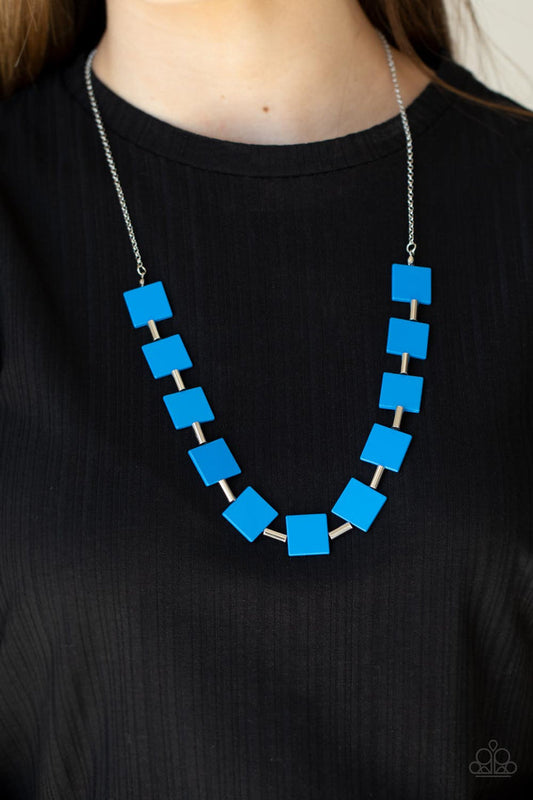 Hello, Material Girl - Blue Necklace - Paparazzi Accessories - Vibrant geometric squares painted in the spring Pantone® of French Blue along a long silver chain. Sleek silver cylinders separate the square plates, adding cool metallic accents to the piece.