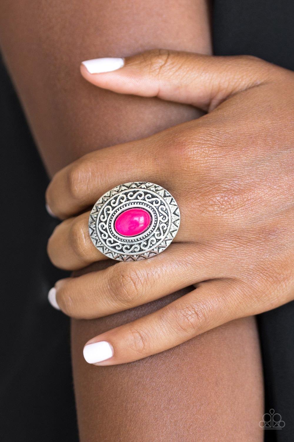 Hello, Sunshine - Pink and Silver Fashion Ring - Paparazzi Accessories - A glowing pink stone is pressed in the center of a dramatic silver frame radiating with shimmery sunburst details for a seasonal look. Features a stretchy band for a flexible fit. Sold as one individual ring.