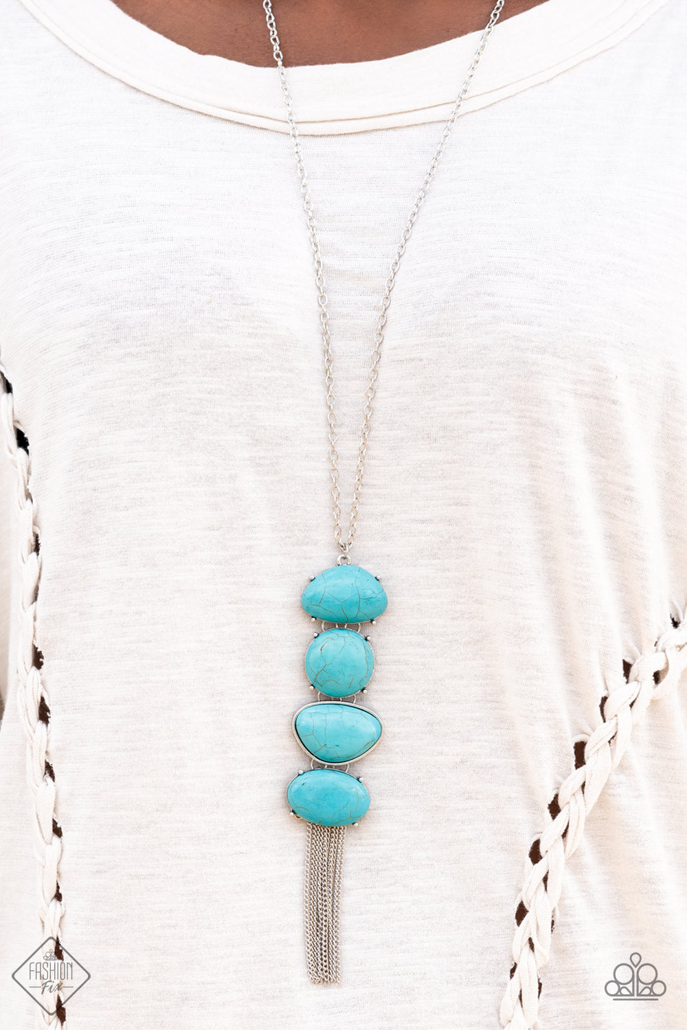 Hidden Lagoon - Blue Turquoise Stone - Silver Necklace - Paparazzi Accessories - Stacked turquoise stones create an oversized pendant that sways from the bottom of a lengthened silver chain. The irregular-shaped stones add artisanal character while a flirty fringe of dainty chains adds playful energy.