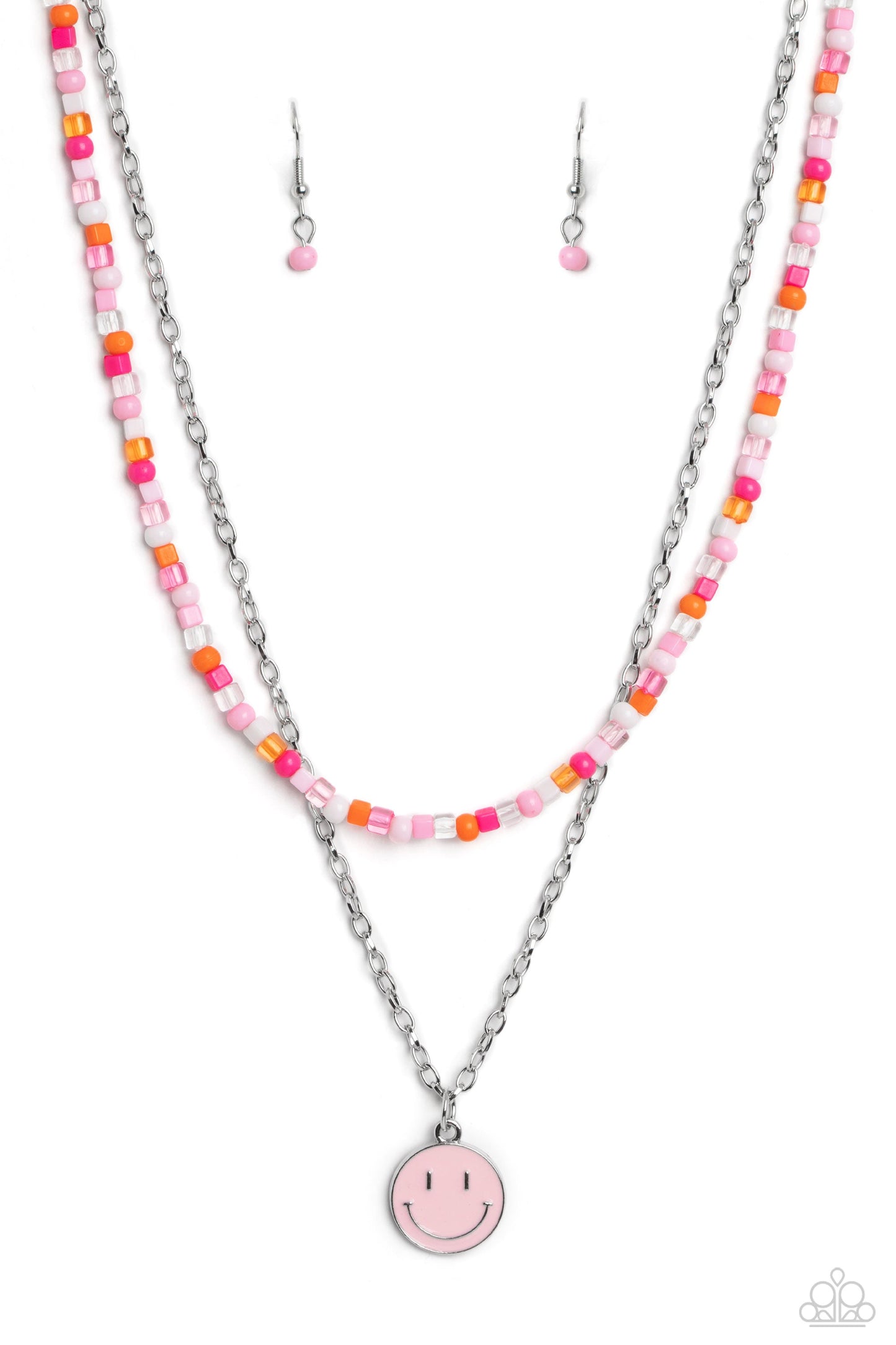 High School Reunion - Pink Seed Bead Necklace - Paparazzi Accessories - Gliding from a dainty, silver chain, a smiley face pendant stands out against a pink backdrop. Completing the charismatic ensemble, a collection of seed beads in shades of light pink, white, pink, orange, and hot pink create bright pops of color around the neckline for a youthful finish.