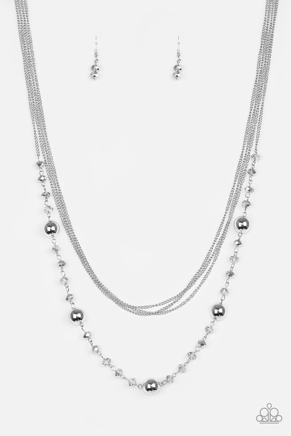 High Standards - Silver Layered Necklace - Paparazzi Accessories - Infused with rows of shimmery silver chains, a strand of glittery metallic crystal-like beads and classic silver accents drape across the chest for a regal finish. Features an adjustable clasp closure. Sold as one individual necklace.