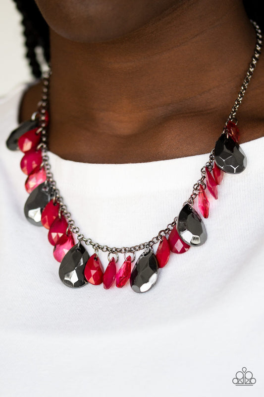Hurricane Season - Red and Gunmetal Necklace - Paparazzi Accessories - Tinted in the robust shade of Wine, glassy and polished red teardrops drip from the bottom of a shimmery gunmetal chain. Faceted gunmetal teardrops trickle between the colorful beading, adding a flashy finish to the flirtatious fringe. Features an adjustable clasp closure.
