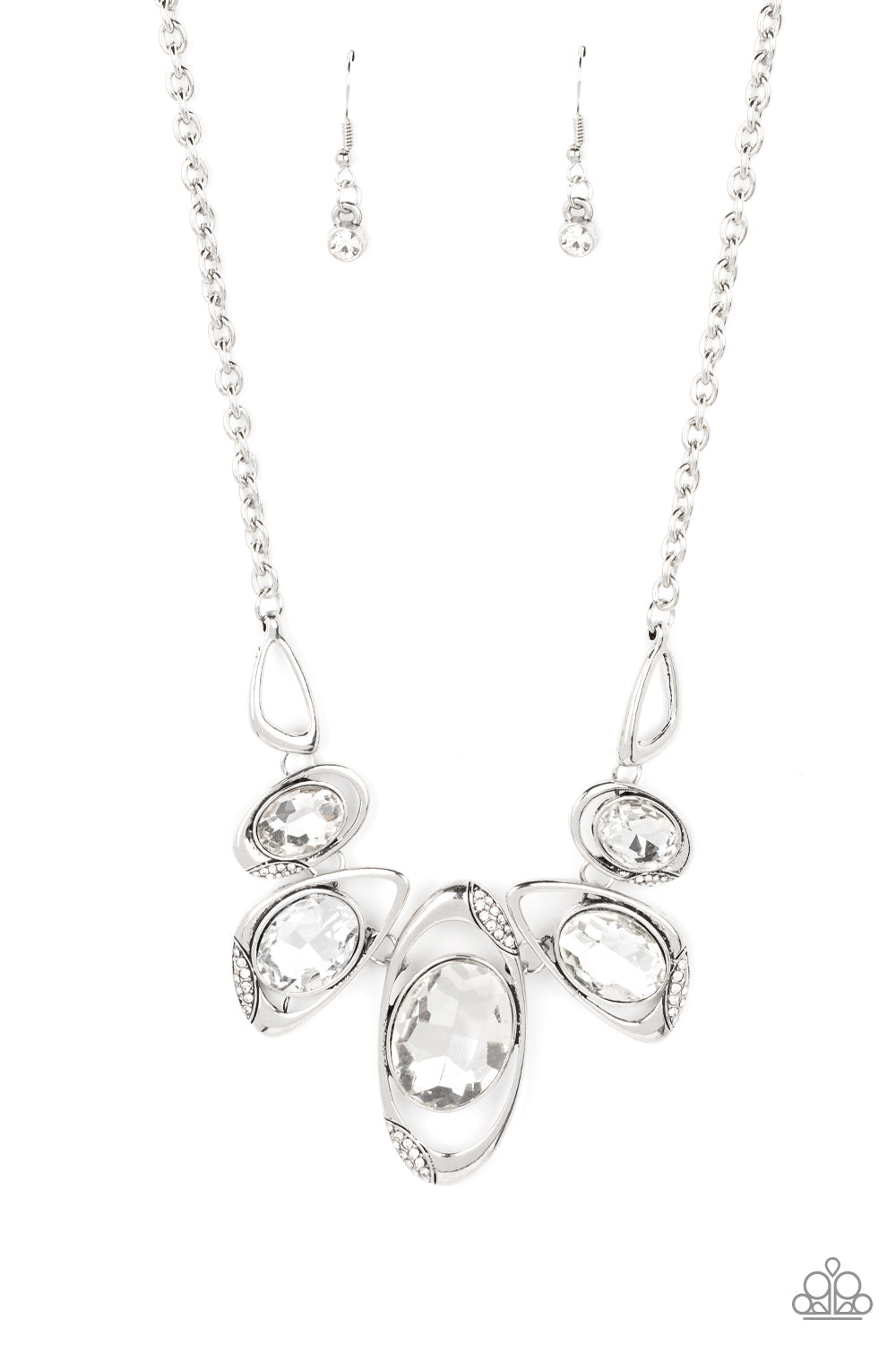 Hypnotic Twinkle - White Gem and Silver Necklace - Paparazzi Accessories - This stunning gem necklace is stunning and great for any occasion or everyday casual wear.  It's dusted in sections of glassy white rhinestones, asymmetrical silver frames curl around oversized white gems below the collar. Varying in shape, the mismatched frames increase in size as they near the center for a hypnotizing finish. Bejeweled Accessories By Kristie 