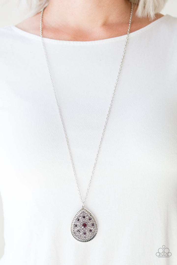I Am Queen - Purple and Silver Necklace - Paparazzi Accessories - A dramatic teardrop pendant swings from the bottom of an elongated silver chain, elegantly slimming the torso. A glittery purple rhinestones are sprinkled along the pendant as silver filigree dances across the center, creating a regal floral pattern.