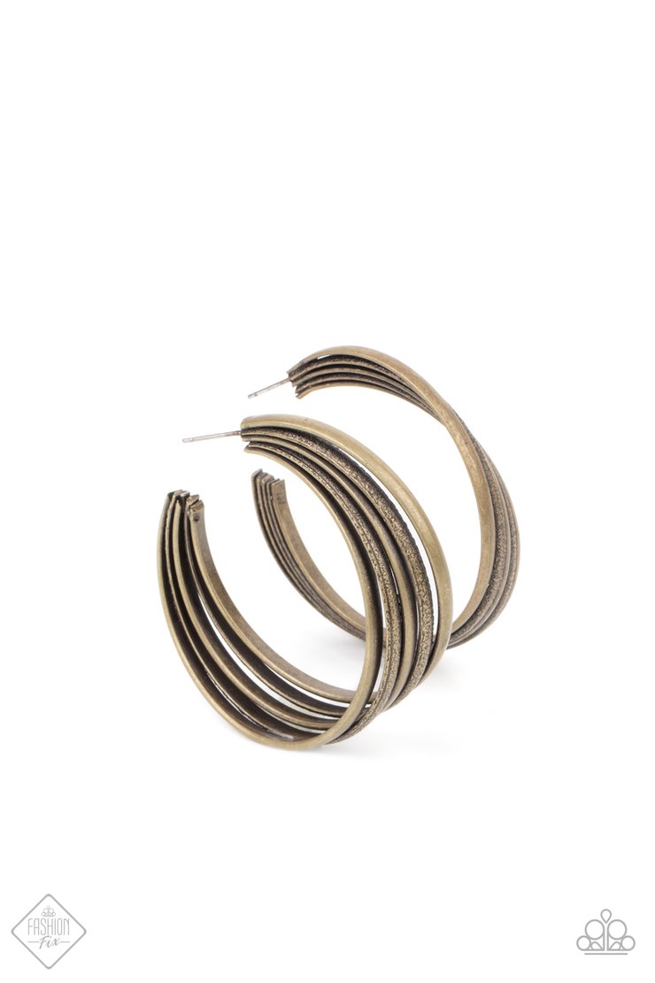 In Sync - Brass Hoop Earrings - Paparazzi Accessories - 
Textured brass rings merge with antiqued matte rings in a curvy ribbon of rustic drama as they wrap around behind the ear. Earring attaches to a standard post fitting. Hoop measures approximately 2" in diameter. Sold as one pair of hoop earrings.
