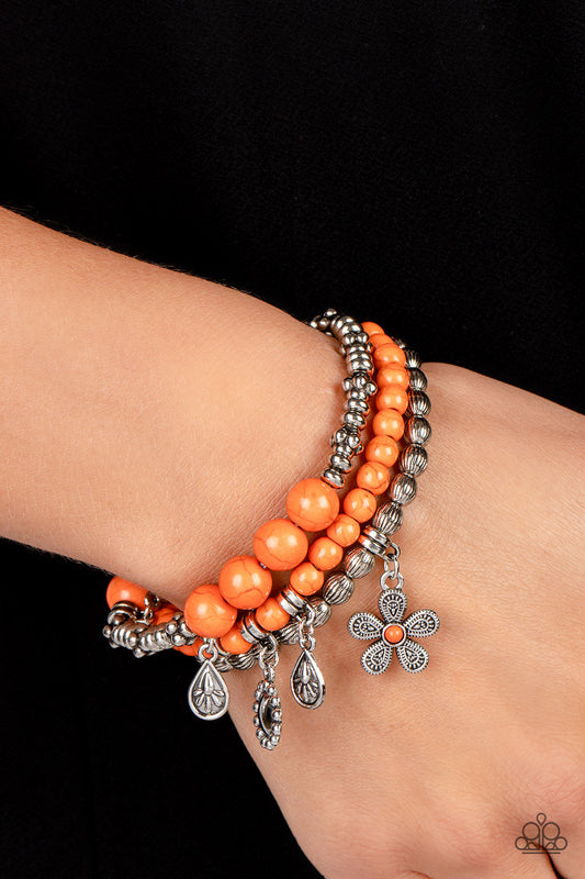 Individual Inflorescence - Orange and Silver Floral Charm Bracelets - Paparazzi Accessories - A trio of floral-inspired bracelets, featuring comfortable stretchy bands and smooth orange stones, stack along the wrist to create a bold statement piece.
