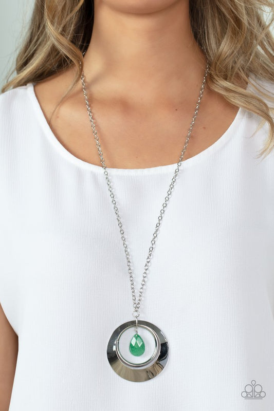 Inner Tranquility - Green Jade - Necklace & Earrings - Paparazzi Accessories - 
A faceted jade teardrop swings from the top of a bold silver ring and flared silver hoop, creating an enchanting pendant at the bottom of a lengthened silver chain. Features an adjustable clasp closure.
