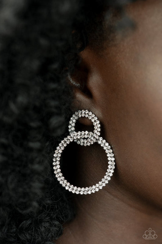 Intensely Icy - Black Rhinestone Earrings - Paparazzi Accessories - Rows of sparkly white rhinestones encircle into two interconnected hoops, creating a jaw-dropping lure. Earring attaches to a standard post fitting. Trendy fashion jewelry for everyone.