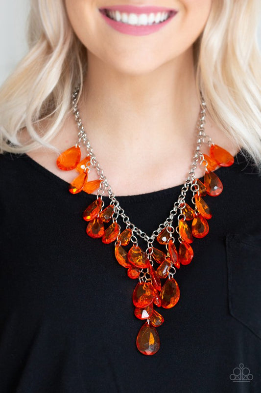 Irresistible Iridescence - Orange and Silver Necklace - Paparazzi Accessories - Glassy orange teardrops and glassy orange beads swing from the bottom of a shimmery silver chain. Matching beads trickle down free-falling chains, creating a glamorous fringe below the collar fashion necklace. 