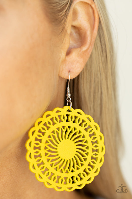 ​Island Sun - Yellow Wood Fashion Earrings - Paparazzi Accessories - Painted in a sunny yellow finish, a stenciled wooden frame is cutout into a radiating sunburst frame for a colorfully tropic look. Earring attaches to a standard fishhook fitting. Sold as one pair of earrings.