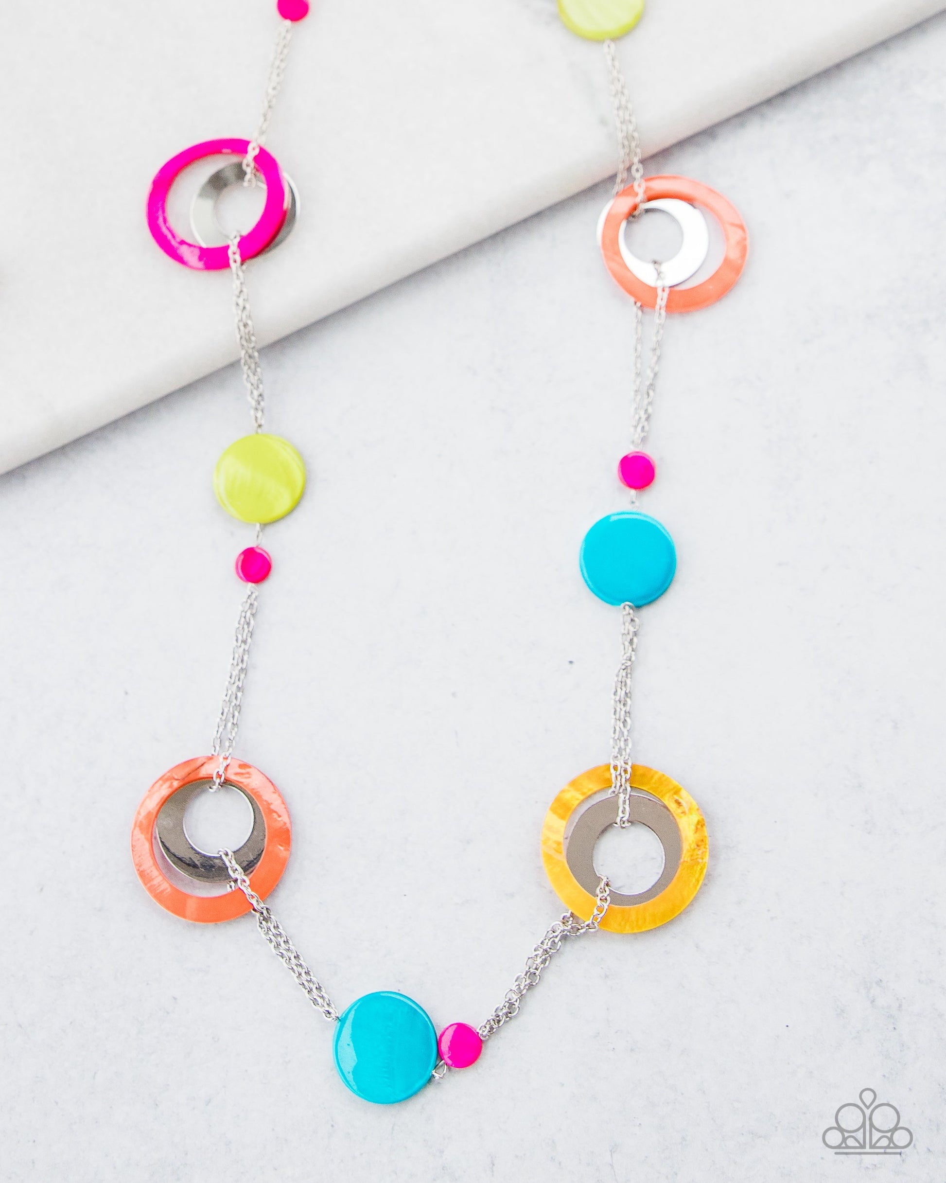 Kaleidoscopically Captivating - Multi Color Fashion Necklace - Casual and colorful fashion necklace. It has chunky brightly-colored rings and discs with swirly marble finishes join thick metal hoops to climb a simple silver chain and create a retro style.