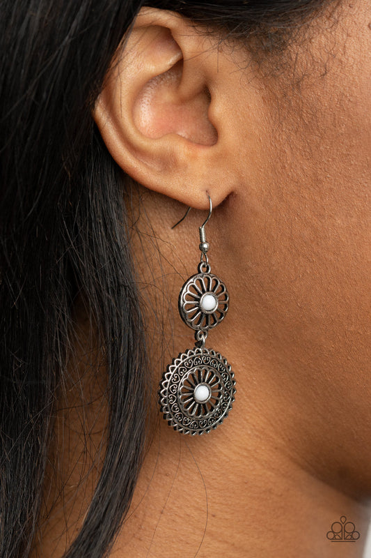 Keep It WHEEL - White and Silver Earrings - Paparazzi Accessories - Dainty white beads adorn the centers of floral patterned silver frames that link into a whimsical lure. Earring attaches to a standard fishhook fitting. Sold as one pair of earrings.