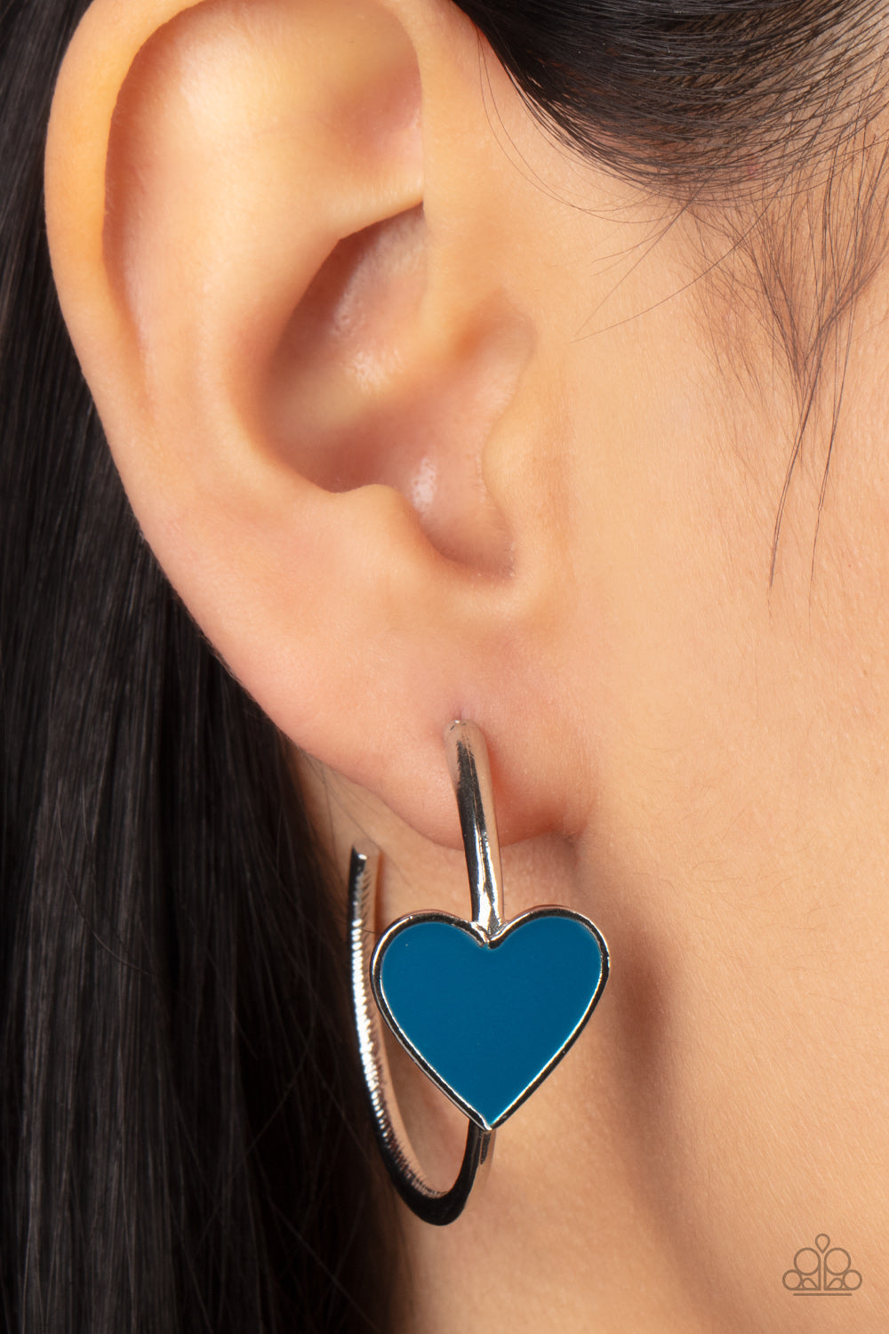 ​Kiss Up - Blue Heart - Silver Hoop Earrings - Paparazzi Accessories - A charming Mykonos Blue heart adorns the front of a classic silver hoop resulting in a whimsical fashion. Earring attaches to a standard post fitting. Hoop measures approximately 1 1/4" in diameter. Sold as one pair of hoop fashion earrings.