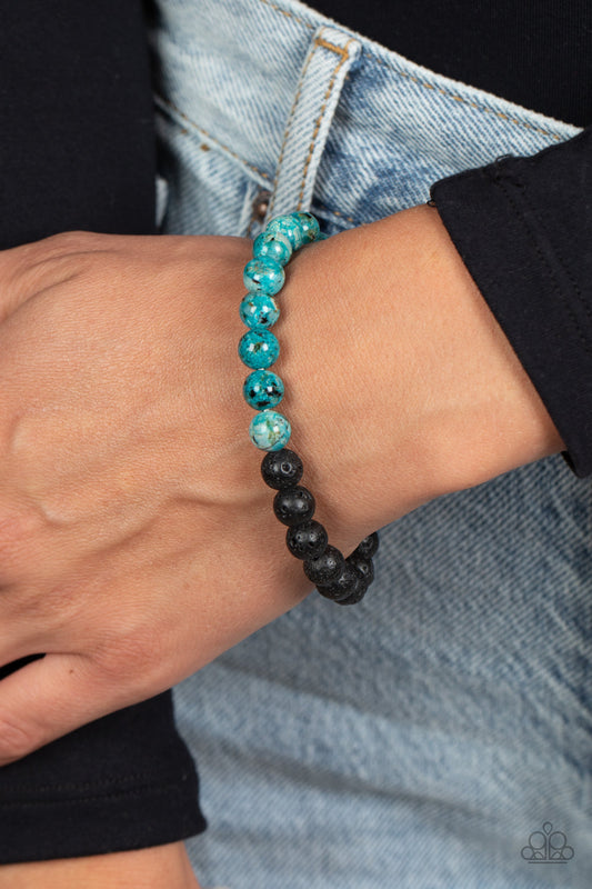 LAVA Language - Blue Stone - Lava Rock Bracelet - Paparazzi Accessories - A collection of refreshing blue stone beads with speckled detailing, and earthy lava rock beads are threaded along a stretchy band around the wrist for an urban finish.