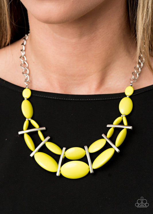 Law of the Jungle - Yellow Fashion Necklace - Paparazzi Accessories - Sectioned off by edgy silver fittings, a flamboyant collection of rebellious Green Sheen beads link into two colorful layers below the collar for a bold pop of color. Features an adjustable clasp closure. Sold as one individual necklace.