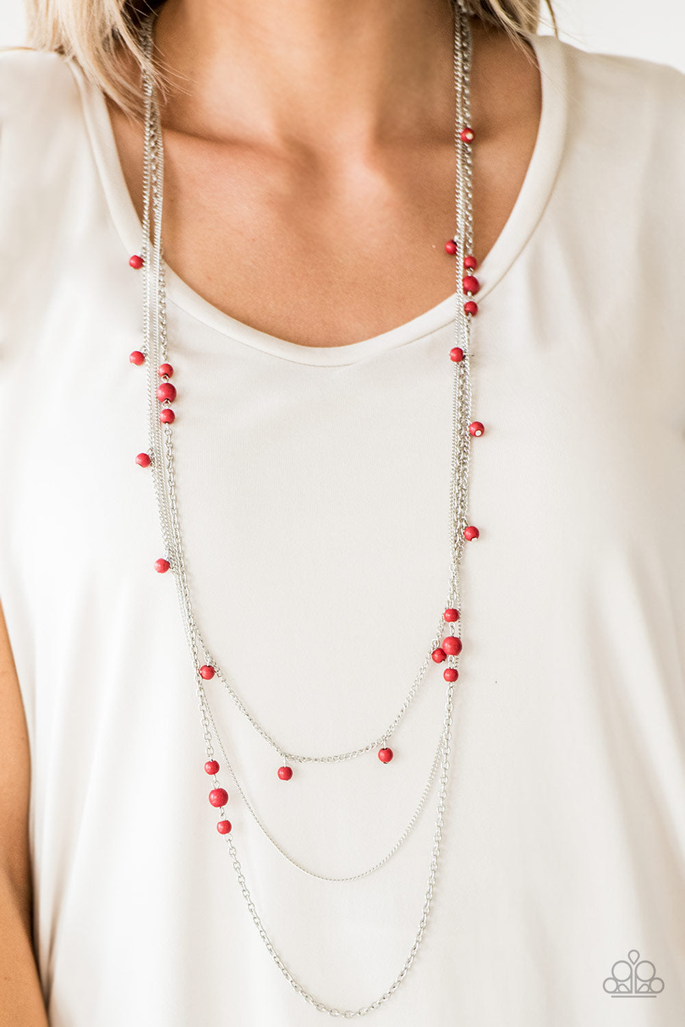 Laying The Groundwork - Red and Silver Necklace - Paparazzi Accessories -
Infused with a plain silver chain, mismatched fiery red stone beads sporadically trickle along shimmery silver chains, creating vivacious layers down the chest. Features an adjustable clasp closure.
Sold as one individual fashion necklace.