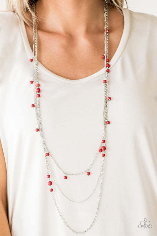 Laying The Groundwork - Red and Silver Necklace - Paparazzi Accessories -
Infused with a plain silver chain, mismatched fiery red stone beads sporadically trickle along shimmery silver chains, creating vivacious layers down the chest. Features an adjustable clasp closure.
Sold as one individual fashion necklace.