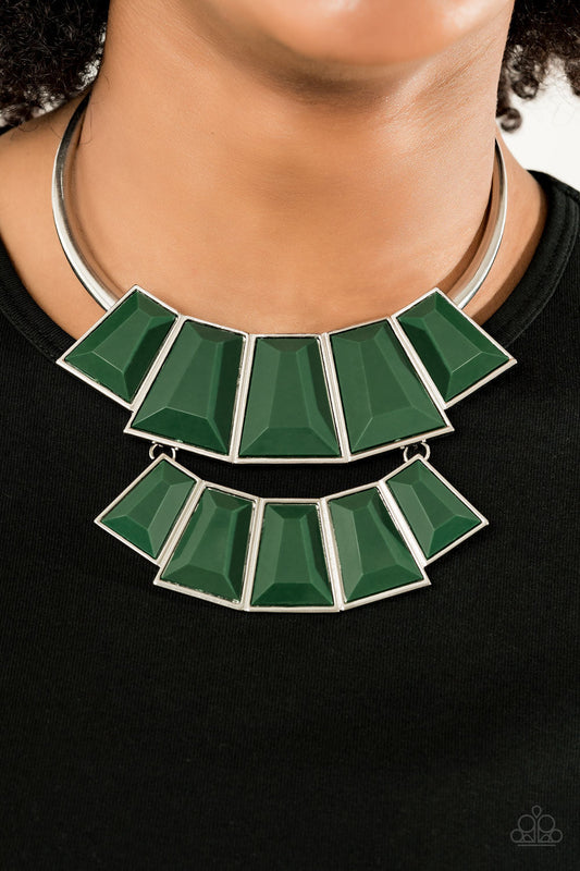 Lions, TIGRESS, and Bears - Green and Silver Necklace - Paparazzi Accessories - Tinted in the lush green hue of Eden, rows of faceted emerald-shaped beads link into colorful beaded plates. The uppermost frame slides along a bowing silver bar, adding playful movement to this fierce statement-making piece. Features an adjustable clasp closure. Sold as one individual necklace.