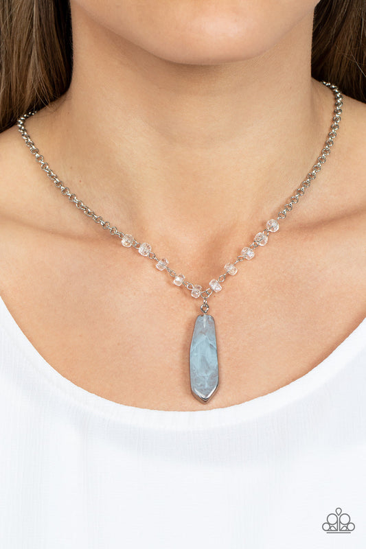 Magical Remedy - Blue and Silver Fashion Necklace - Paparazzi Accessories - Faux stone finish, Glacier Lake smoke in an acrylic frame below the collar. Glittery crystal-like beads sparkle along the silver chain drawing attention to the mystical pendant. Features an adjustable clasp closure.
