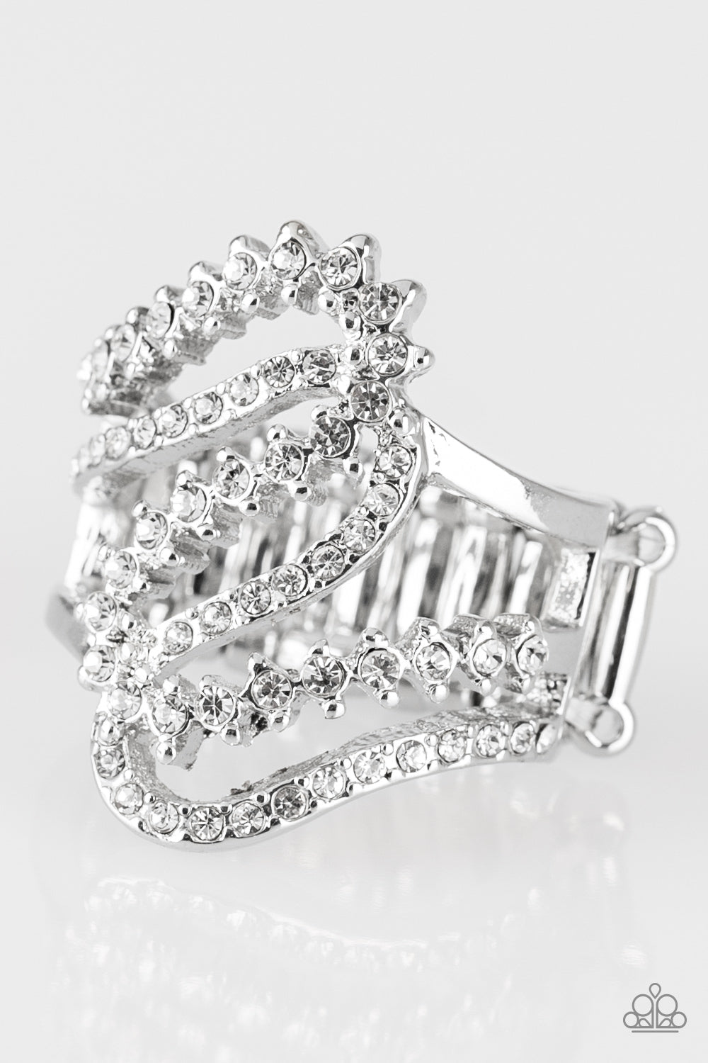 Make Waves - White - Silver Ring - Paparazzi Accessories -Encrusted in dainty white rhinestones, radiant silver ribbons wave across the finger, coalescing into a whimsical band. Features a stretchy band for a flexible fit. Sold as one individual ring.