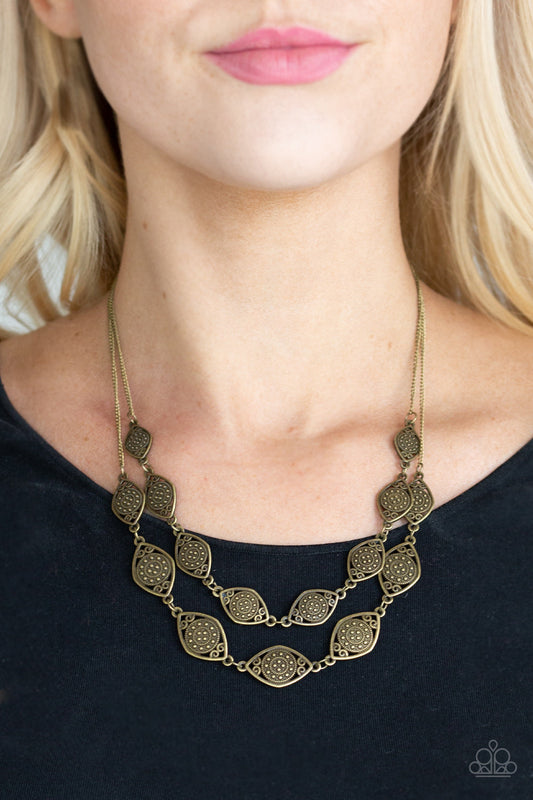 Make Yourself At HOMESTEAD - Brass Fashion Necklace - Paparazzi Accessories - Featuring ornate brass centers, marquise shaped frames link into two rows below the collar for a rustic look.