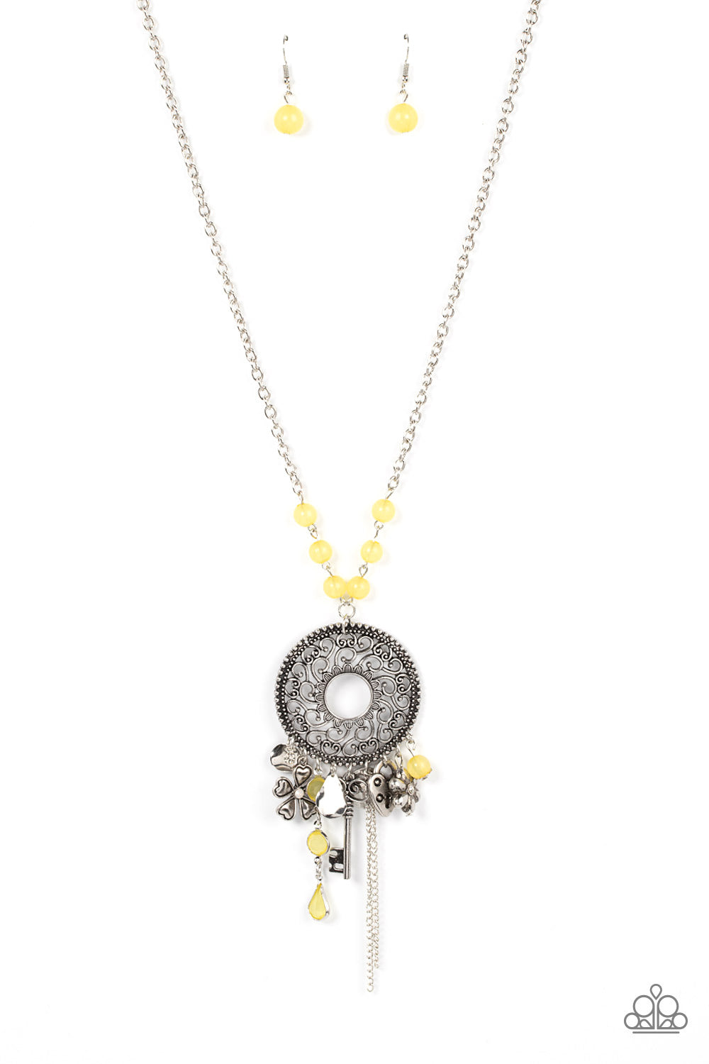 Making Memories - Yellow and Silver Charms Necklace - Paparazzi Accessories - Fashion necklace with glassy yellow beads an assortment of silver key heart and floral charms cascades from an oversized silver pendant with heart shaped vine-like filigree. The frame swings from the bottom of a yellow beaded silver chain, adding a color to the fringe. Features an adjustable clasp closure.
