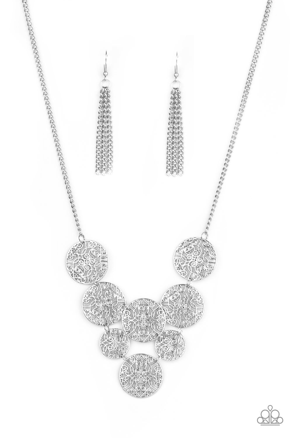 Malibu Idol - Silver Fashion Necklace - Paparazzi Accessories - Shiny mandala-like filigree, a cascade of glistening silver discs link below the collar for a whimsical statement-making fashion. Features an adjustable clasp closure. 