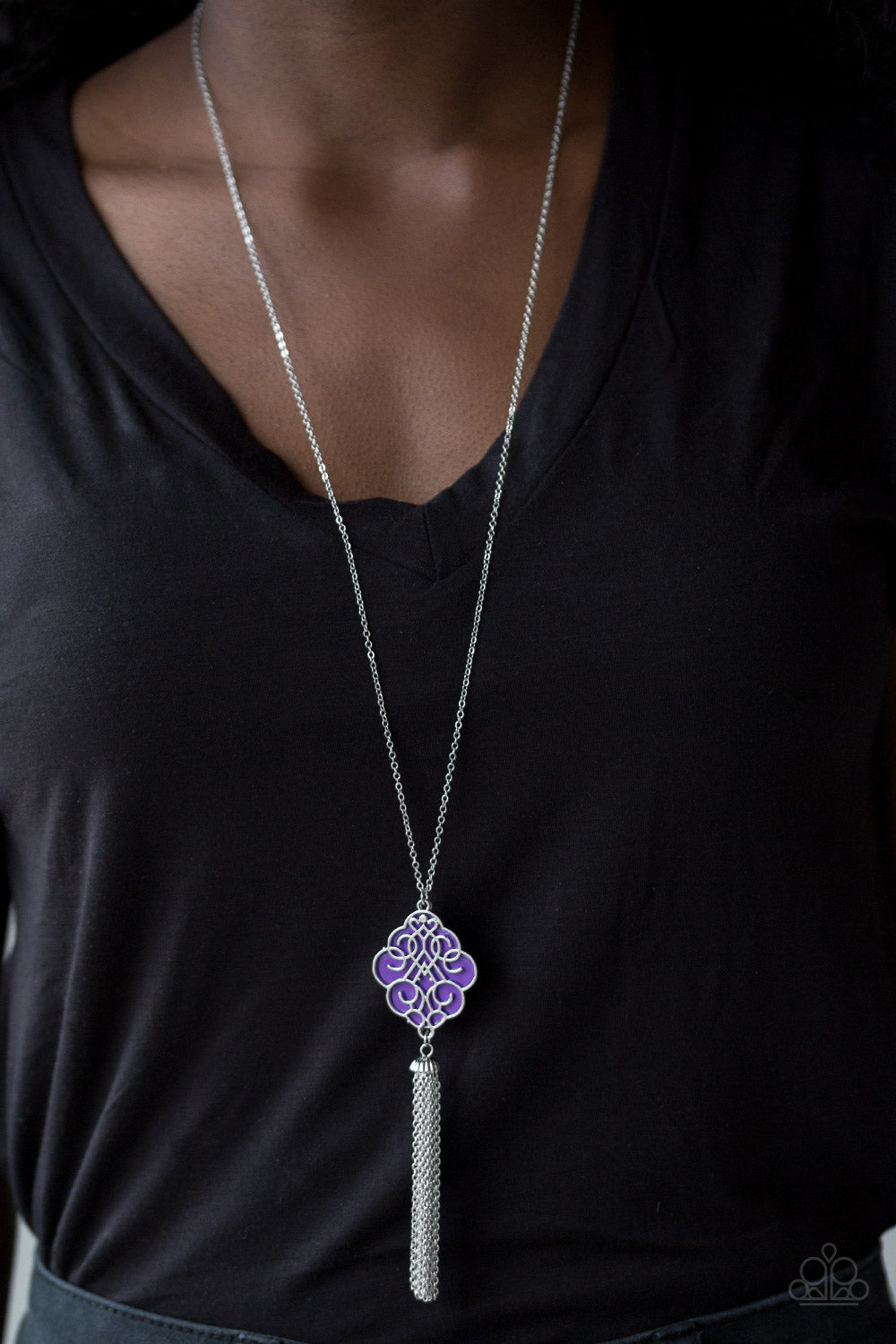 Malibu Mandala - Purple and Silver Necklace & Earrings - Paparazzi Accessories - 
Shimmery silver filigree swirls across a shiny purple backdrop, coalescing into a colorful pendant. A glistening silver chain tassel swings from the bottom of the pendant for a whimsical finish. Features an adjustable clasp closure.