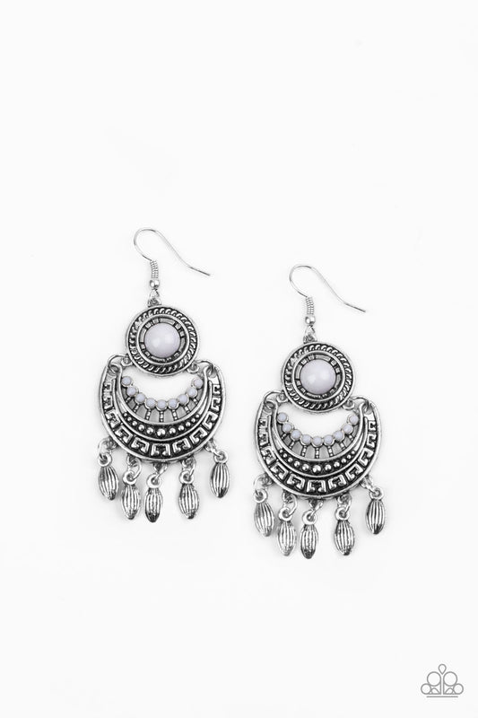 Mantra to Mantra - Silver Earrings - Paparazzi Accessories - Bejeweled Accessories By Kristie - Trendy fashion jewelry for everyone - Dotted with a shiny gray beaded center, a round silver frame gives way to an ornate silver crescent. Dainty silver beads swing from the bottom of the stacked frames, adding a whimsical fringe to the tribal inspired lure. Earring attaches to a standard fishhook fitting. Sold as one pair of earrings.