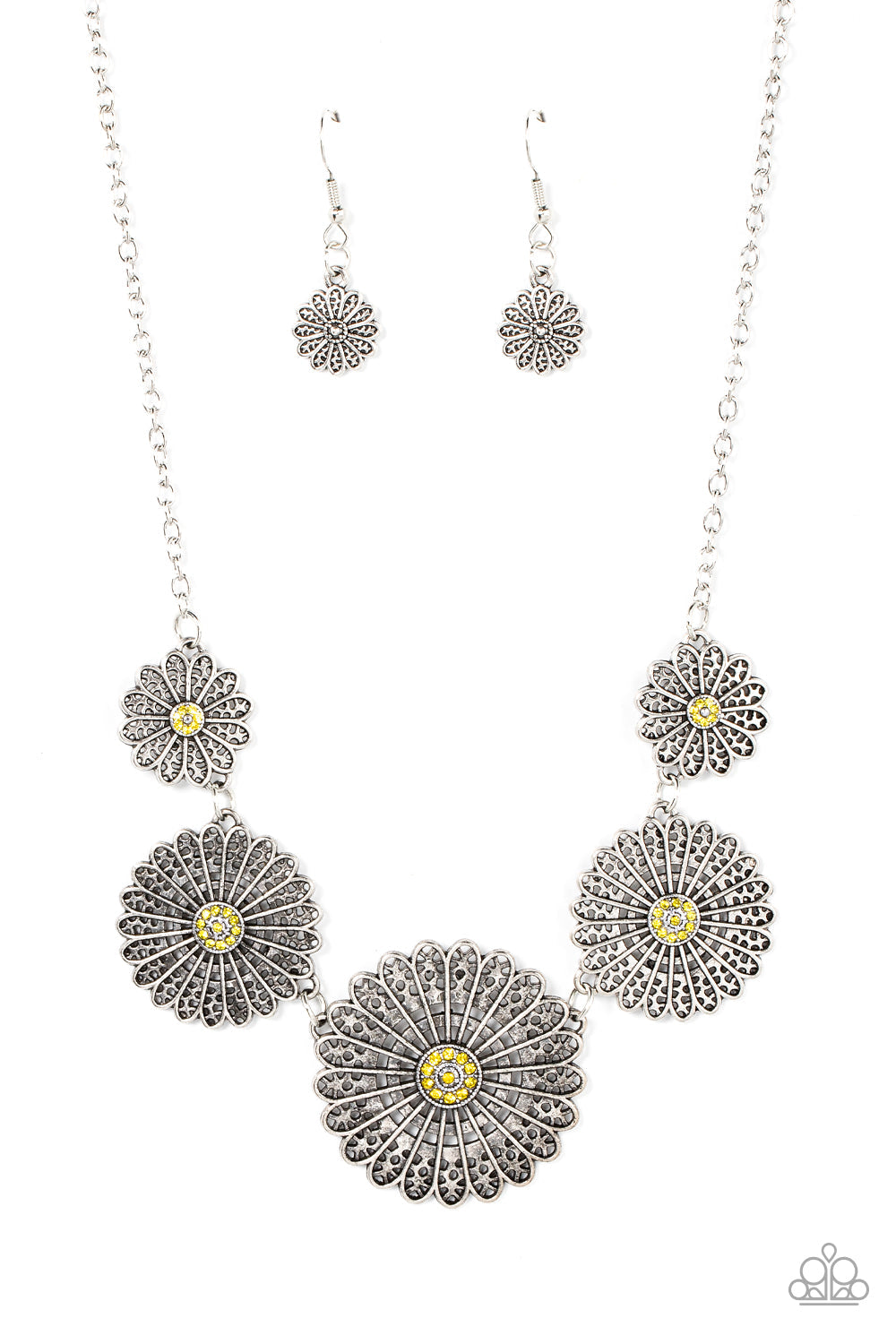 Marigold Meadows - Yellow and Silver Floral Necklace - Paparazzi Accessories - Infused with a whimsical mandala-like motif, tactile silver petals bloom from yellow rhinestone dotted centers below the collar. The mismatched silver flowers gradually increase in size, exaggerating the eye-catching details. Features an adjustable clasp closure.