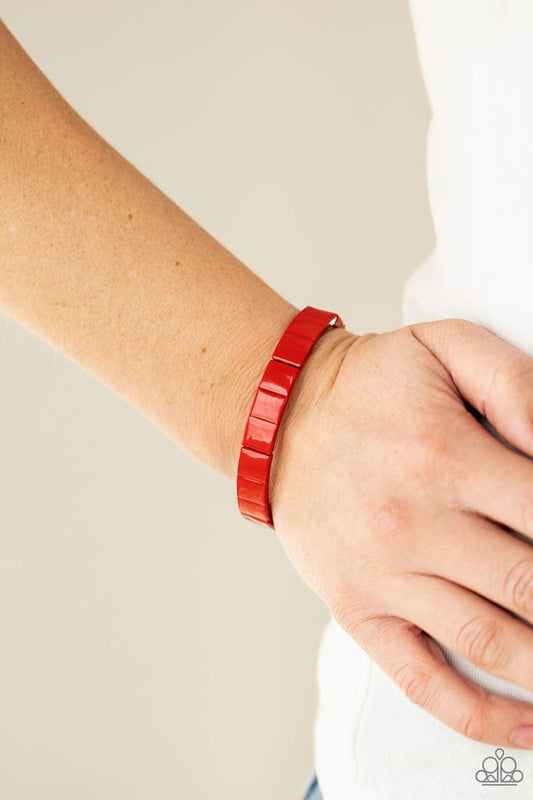 Material Movement - Red Stretchy Bracelet - Paparazzi Accessories - Metal rectangles painted in a fiery red finish are threaded along stretchy bands, forming a gorgeous pop of color that wraps around the wrist. Sold as one individual bracelet.
