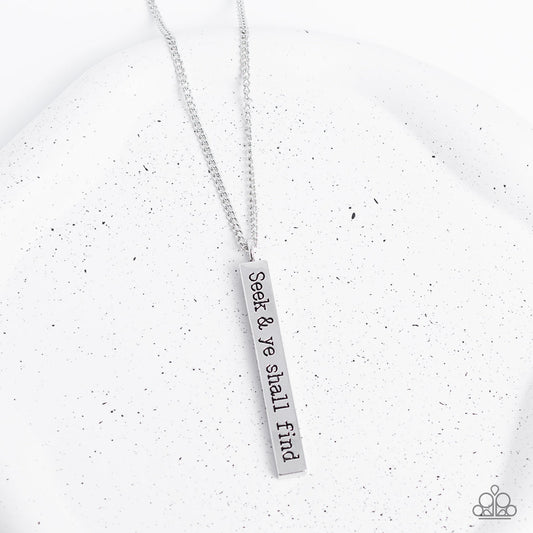 Matt 7:7 - Silver Fashion Necklace - Paparazzi Accessories - A flattened rectangular pendant is stamped in the biblical phrase, "Seek & ye shall find. Matt 7:7," creating an inspirational sight at the bottom of an extended silver chain. Features an adjustable clasp closure.