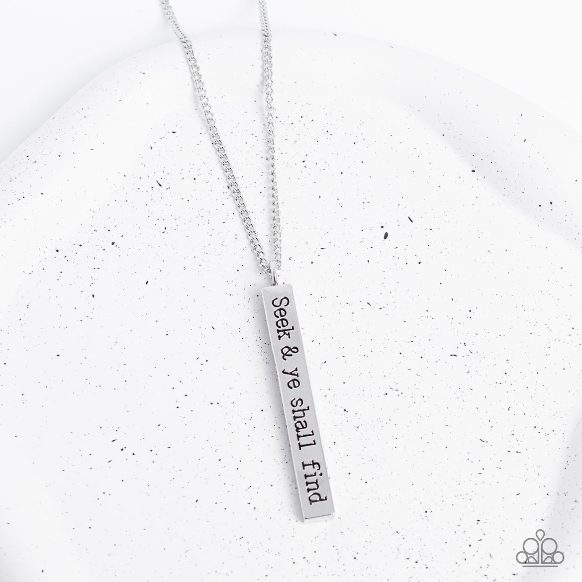 Matt 7:7 - Silver Fashion Necklace - Paparazzi Accessories - A flattened rectangular pendant is stamped in the biblical phrase, "Seek & ye shall find. Matt 7:7," creating an inspirational sight at the bottom of an extended silver chain. Features an adjustable clasp closure.