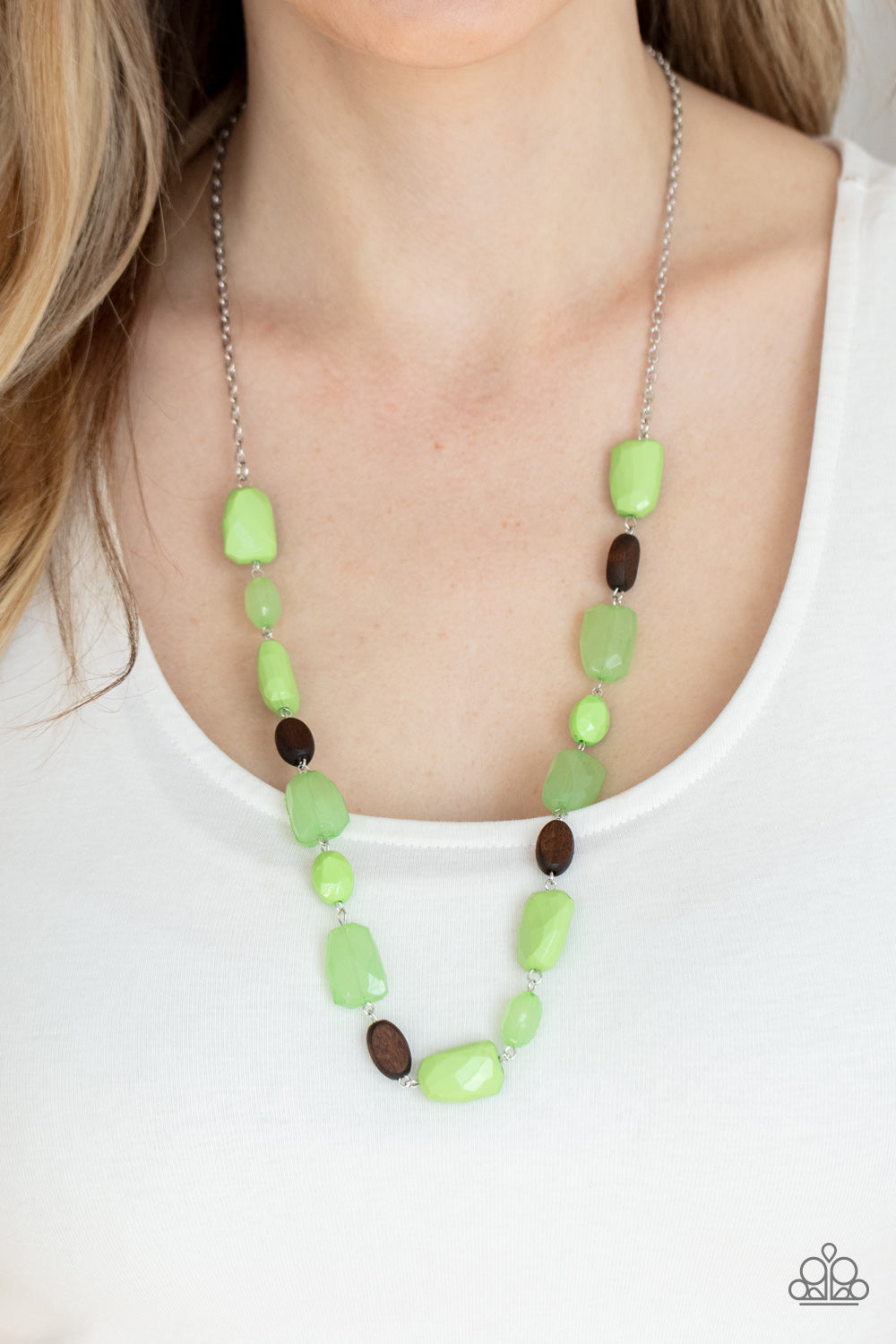 Meadow Escape - Green and Brown Wood - Necklace & Earrings - Paparazzi Accessories - 
Varying in opacity, a mixed assortment of faceted Apple Green beads delicately link with dainty wooden beads across the chest, creating a whimsically earthy display. Features an adjustable clasp closure.
