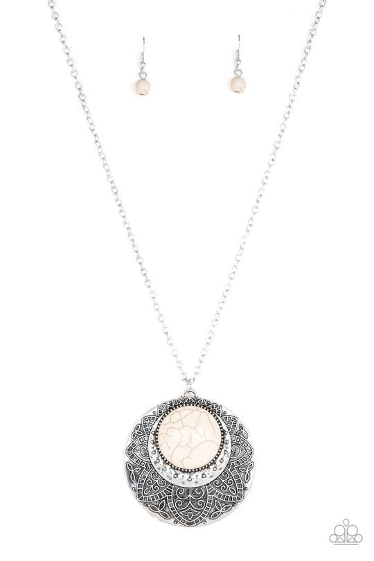 Medallion Meadow - White Crackle - Silver Fashion Necklace - Paparazzi Accessories - Refreshing white stone is pressed into a hammered silver medallion radiating with floral details swings from a long silver chain for a bold tribal stylish necklace.